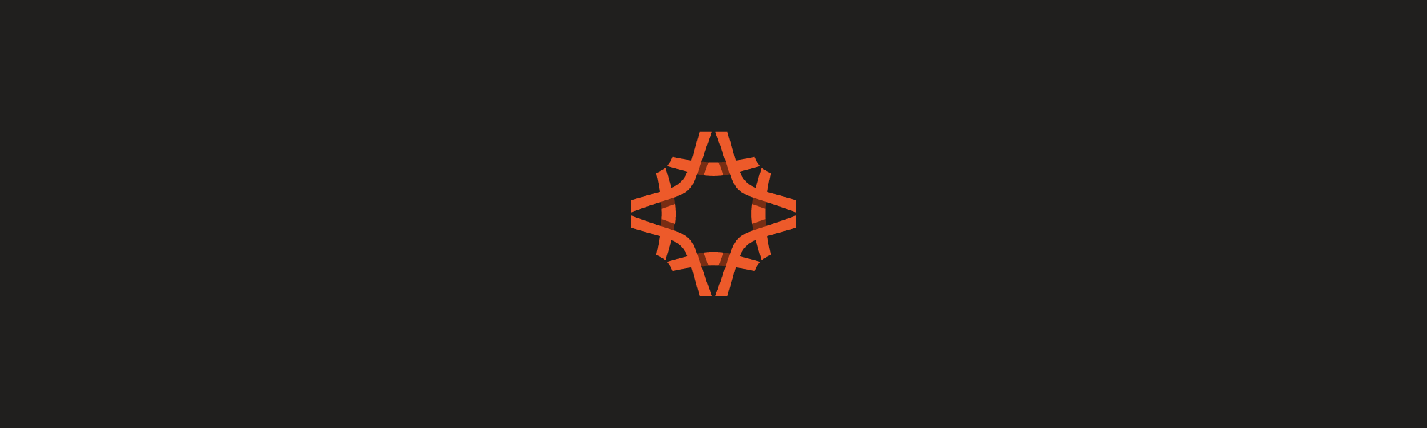 A red and black logo with an orange star in the middle.