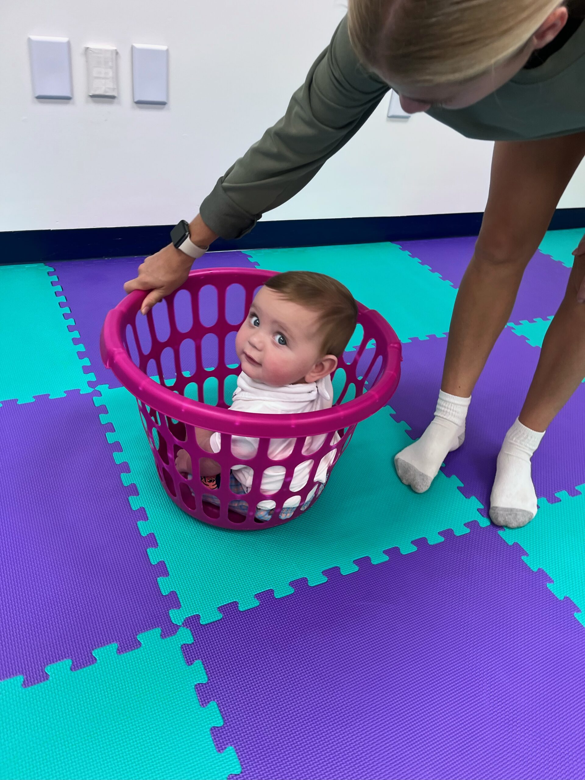 toddler in basket